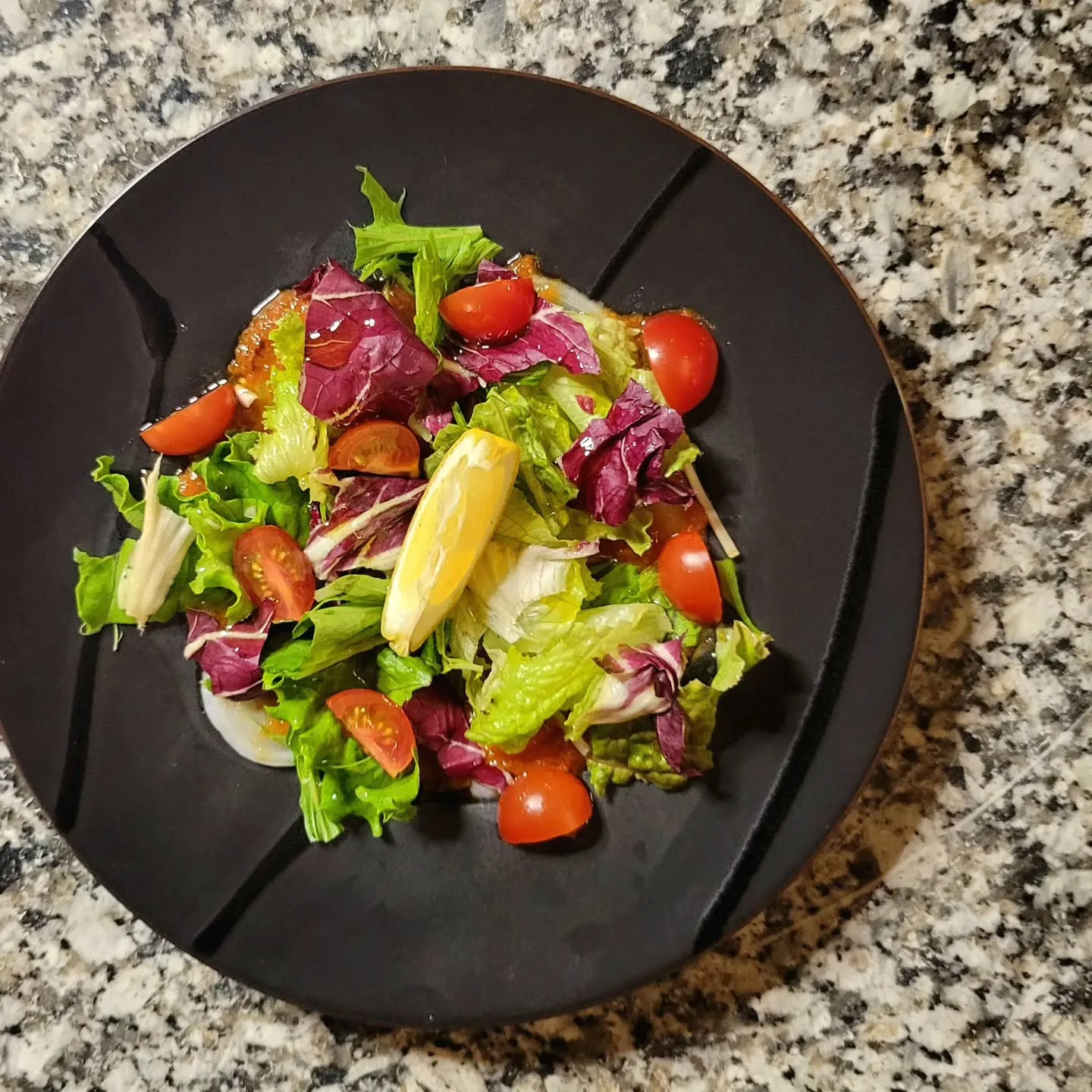 北海道産水タコのカルパッチョ～ドライトマトと青森県産ニンニク...